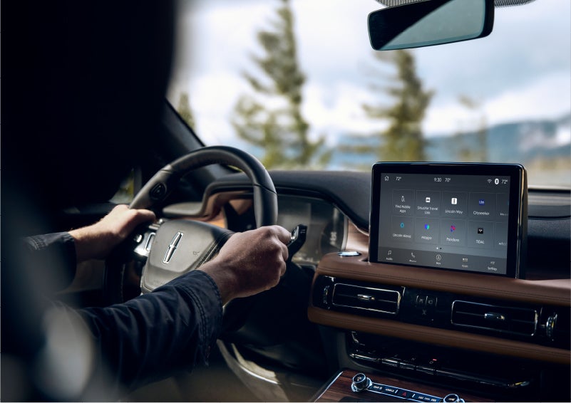 The Lincoln+Alexa app screen is displayed in the center screen of a 2023 Lincoln Aviator® Grand Touring SUV | Lincoln North Miami in North Miami FL