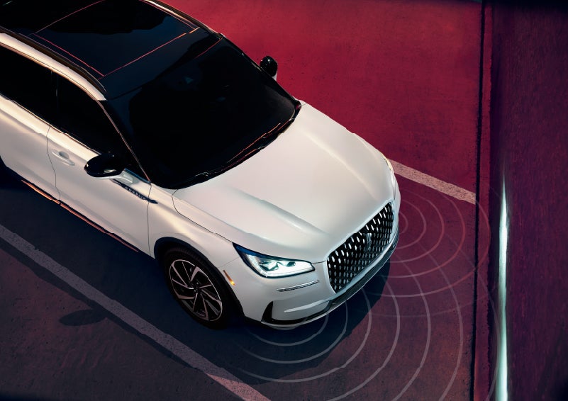 Simulated radar signals are shown emitting from the front of a 2026 Lincoln Corsair® SUV. | Lincoln North Miami in North Miami FL