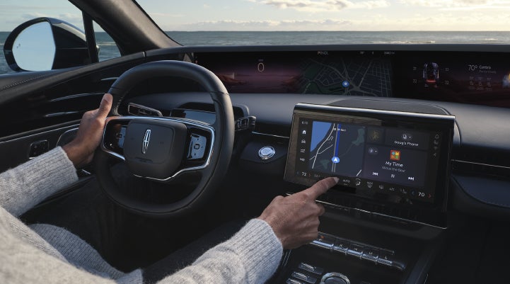 The driver of a 2026 Lincoln Nautilus® SUV interacts with the new Lincoln Digital Experience. | Lincoln North Miami in North Miami FL