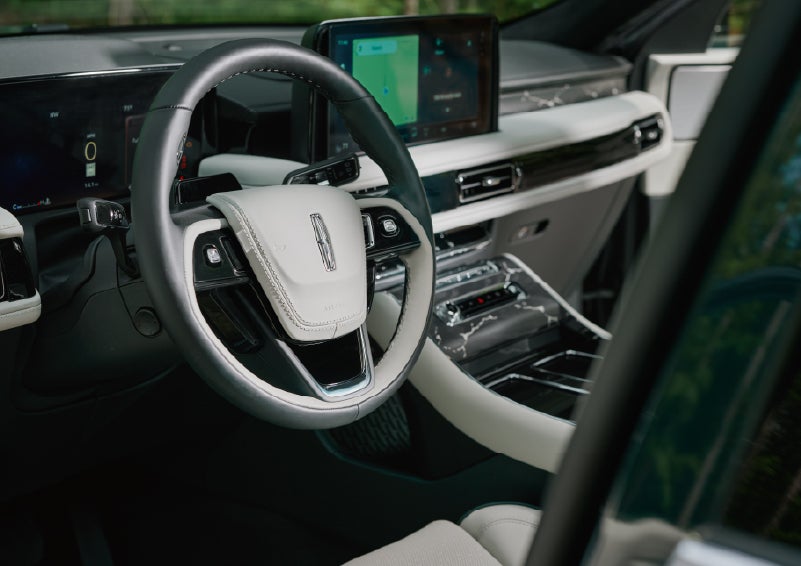 The leather-trimmed steering wheel of a 2027 Lincoln Aviator® Black Label™ SUV. | Lincoln North Miami in North Miami FL
